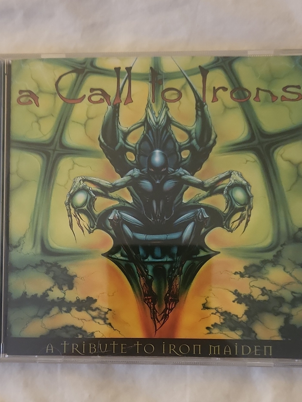 A Call to Irons - A Tribute to Iron Maiden (Green/Black) CD